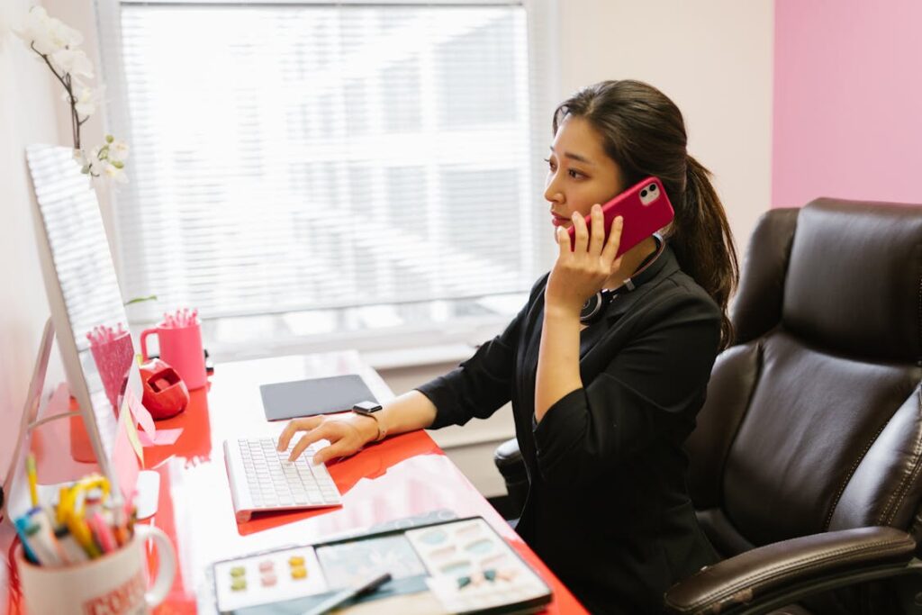 Employees using office water cooler from water delivery service in Lake Worth FL