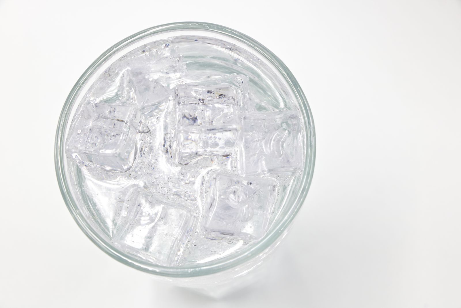 Close-up of a glass of ice water on a hot summer day